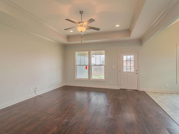 living room opens to kitchen