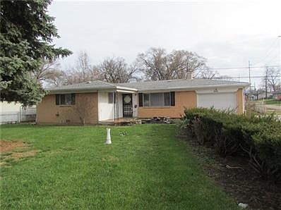 Front of House at 901 N. Traub Ave. Covered Front Porch and 1 Car Attached Garage.