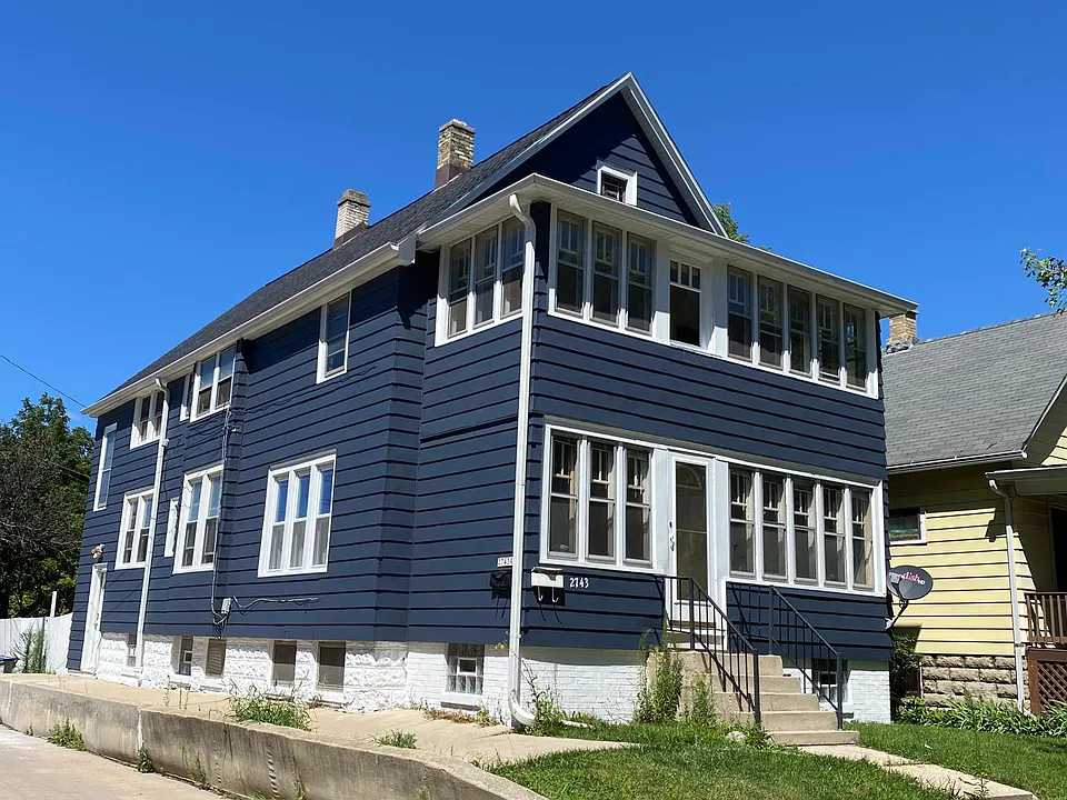 This duplex has a freshly updated exterior, new concrete work still to take place