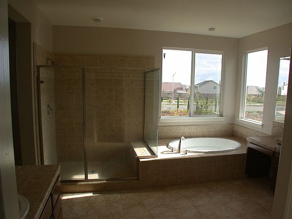 Master bath has jet tub, his/hers sinks 