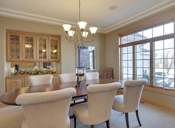 Spacious formal dining room with built-in hutch.