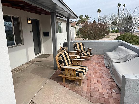 Front Patio with plenty of room for entertaining. Couches and chairs can stay if desired.