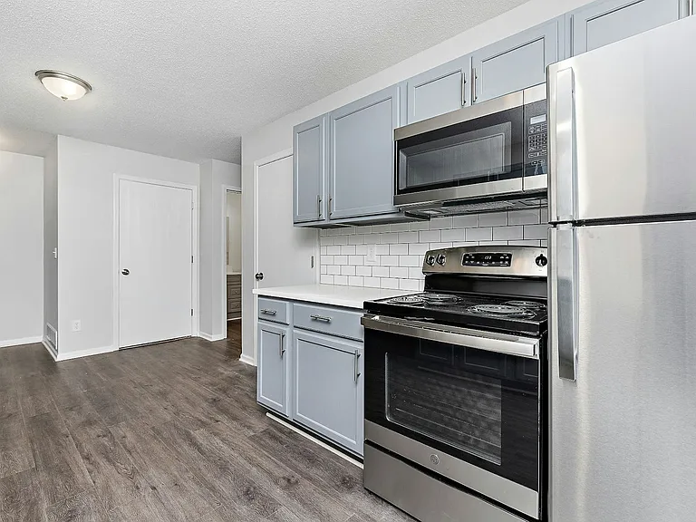 Kitchen - New appliances, countertops, cabinets, backsplash