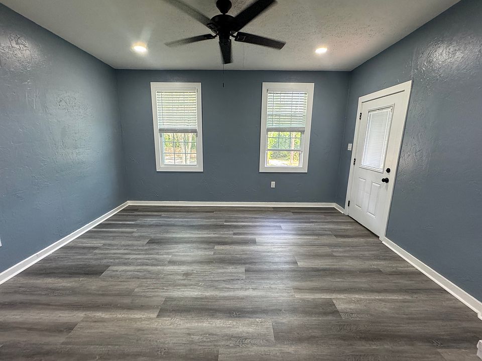 FAMILY ROOM VIEW WITH FRONT DOOR ENTRANCE