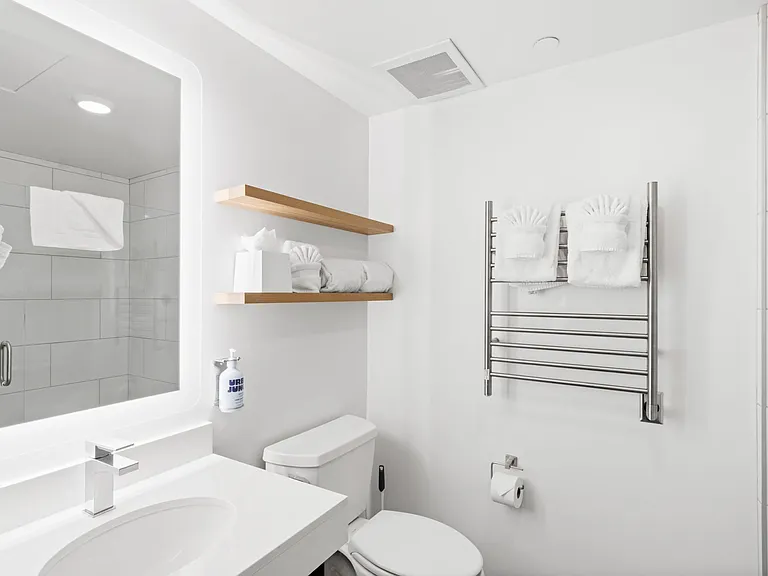 Elegant bathroom with heated towel racks!
