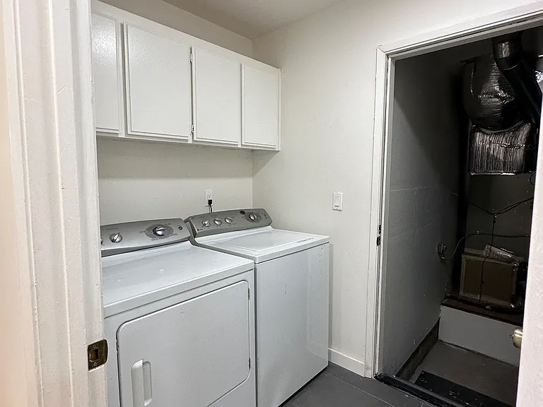 Laundry room with washer & dryer included