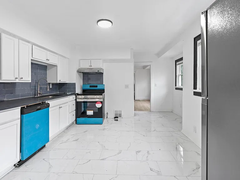 5408 Woodland Ave — Photo 15