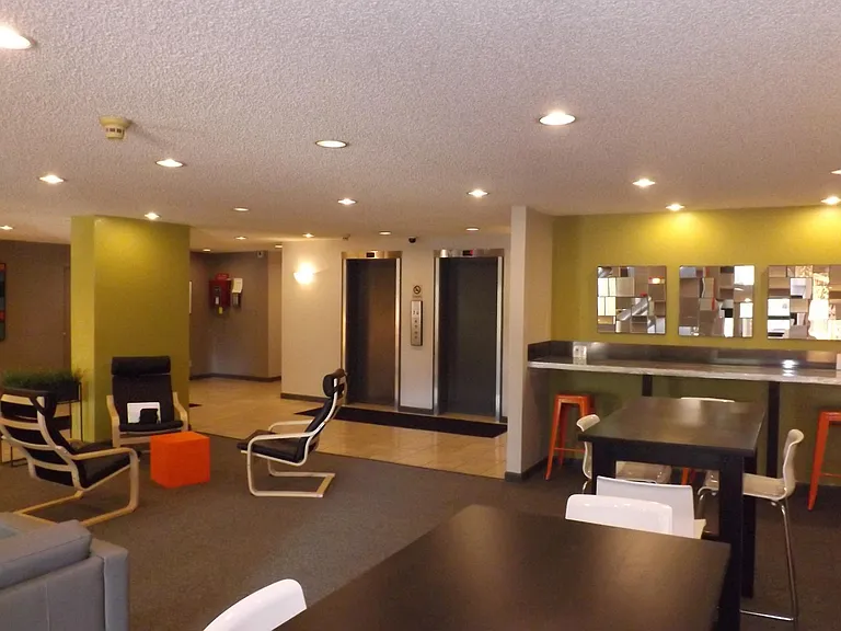 Meeting area inside of the Wellington Square building just by the entryway.