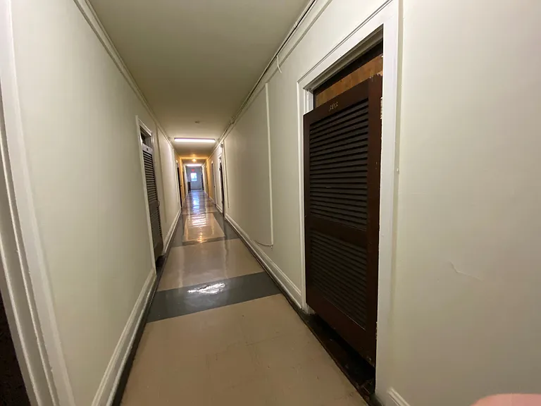 Looking westward down the hall, towards the fire escape.