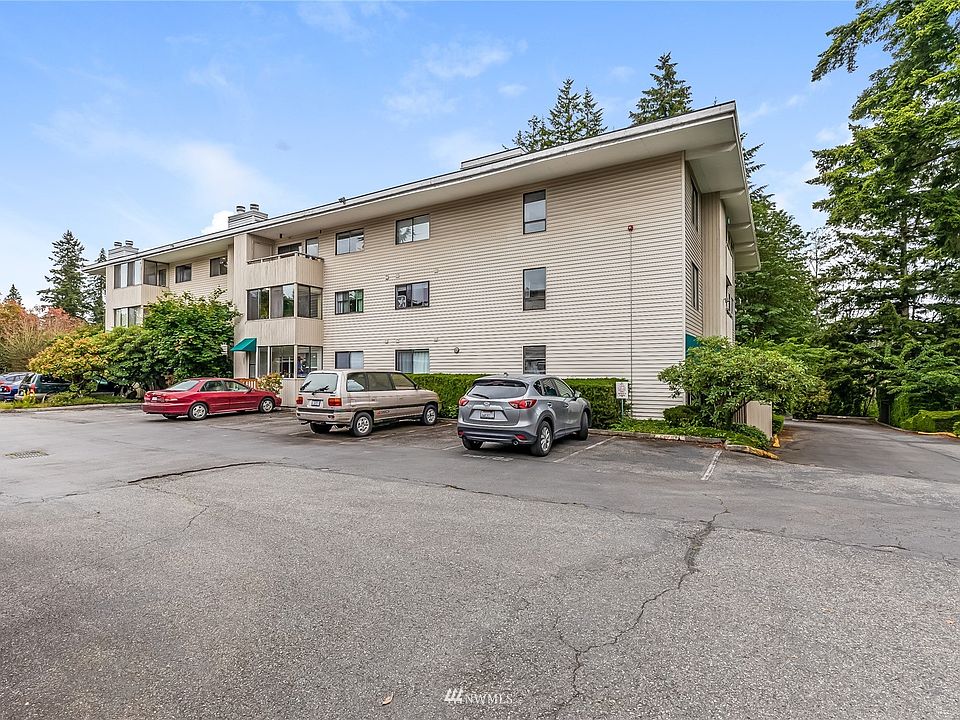 Gated Community with plenty of guest parking & Elevator access to top floor corner unit!