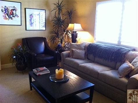 Family room / den / 3rd bedroom with king size hide-a-bed couch with extra cushion for your guest's comfort.  This room is set up with desk, internet and TV so you can relax and/or work.