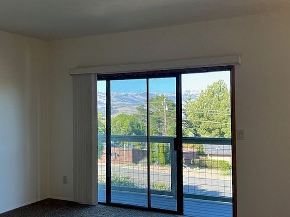 Sliding glass doors to balcony from living room