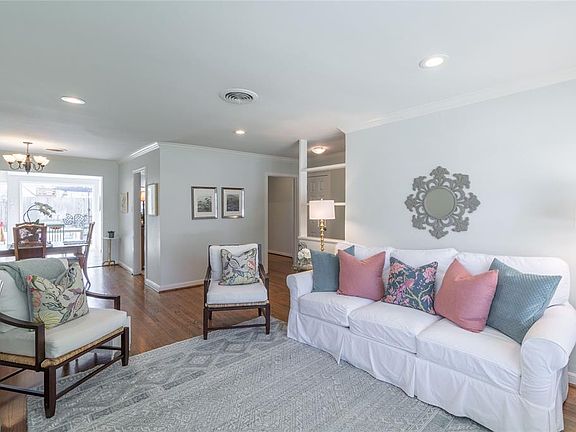 The living room is open to the dining room and provides a great place for entertaining.