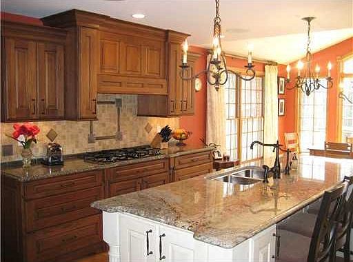 Fully equipped gourmet kitchen with center island.