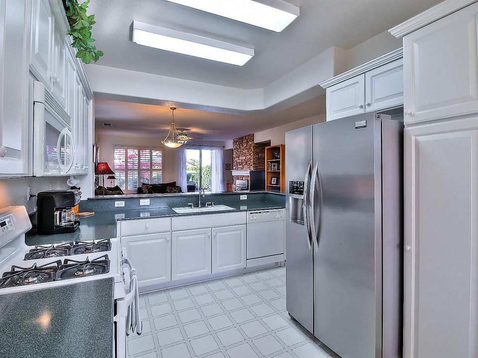 Remodeled kitchen-corian counter/stianless steel refrig