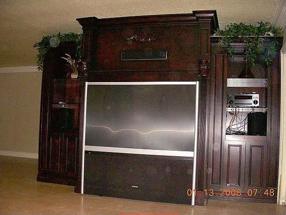 Entertainment Center with a 65 inch Toshiba Leaving for new Home owner