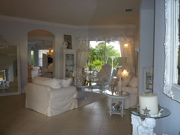 Formal Dining Rm w/View of your Tropical Oasis