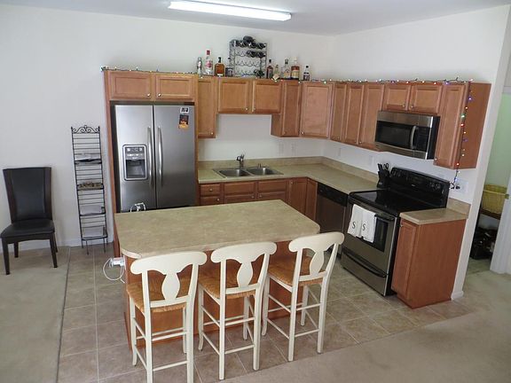 Open floor plan with stainless appliances