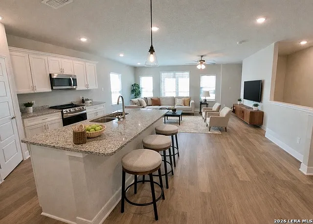 7122 Magnolia Vlg — Photo 3