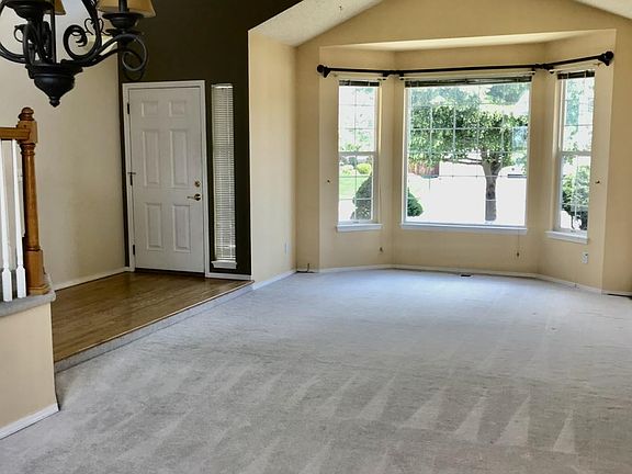 Front door and formal living room and dining room.