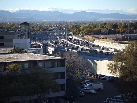 view of mountains from living room and both bedrooms