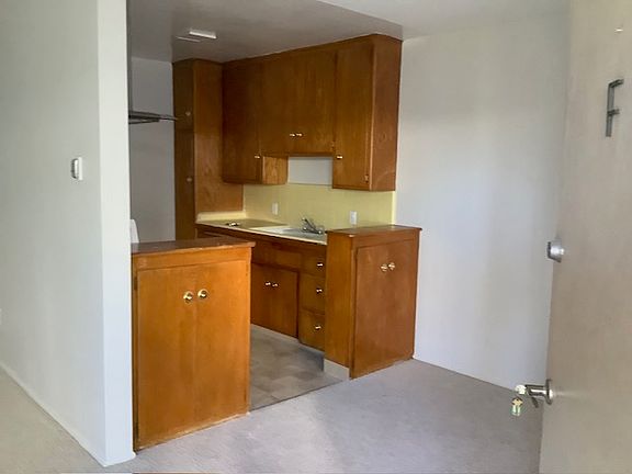 Kitchen and dining room from front door.