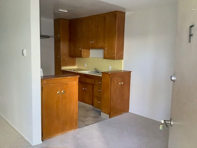 Kitchen and dining room from front door.