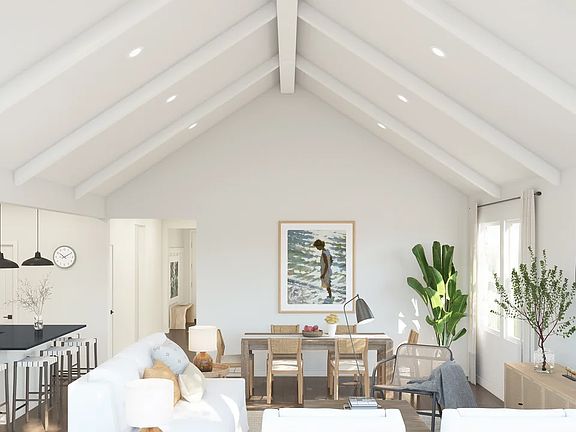 Vaulted ceiling with white painted ceiling beams