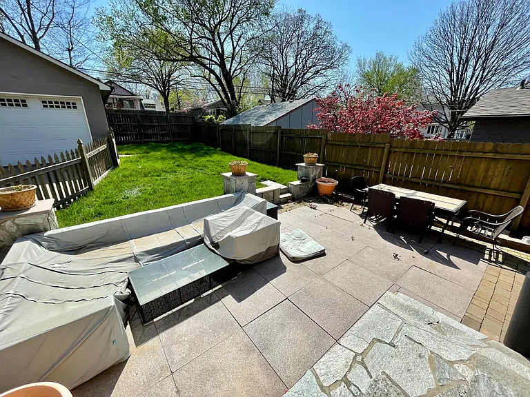 Back patio with with fenced in yard