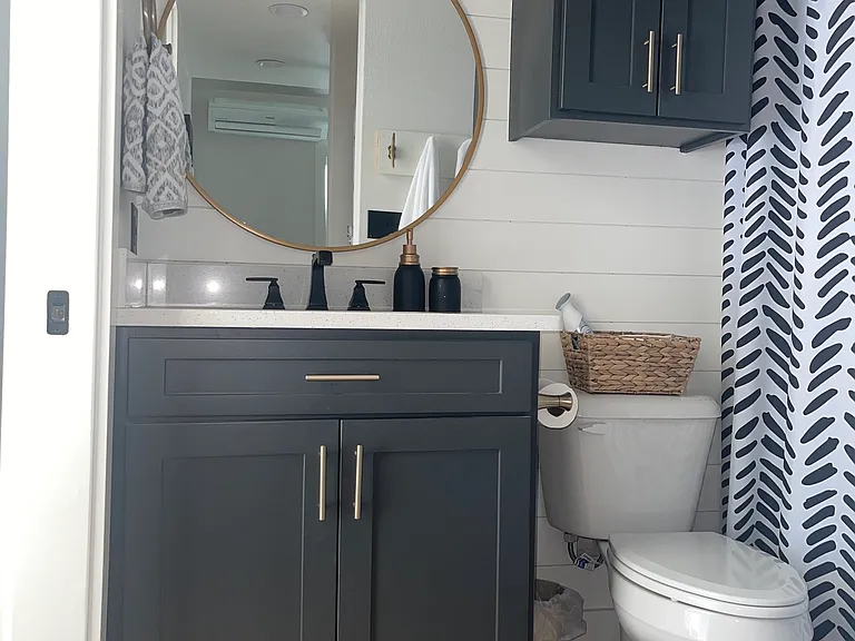Full bathroom with tub shower