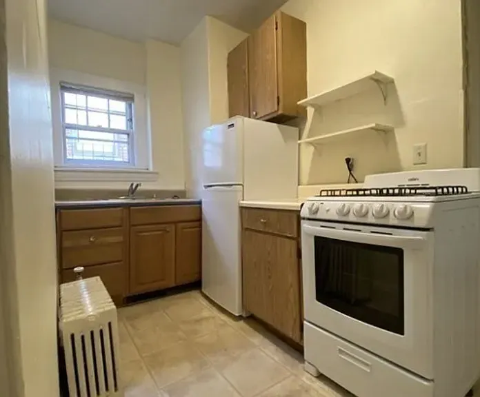 Eat-In Kitchen with Gas Stove and Full-Size Refrigerator
