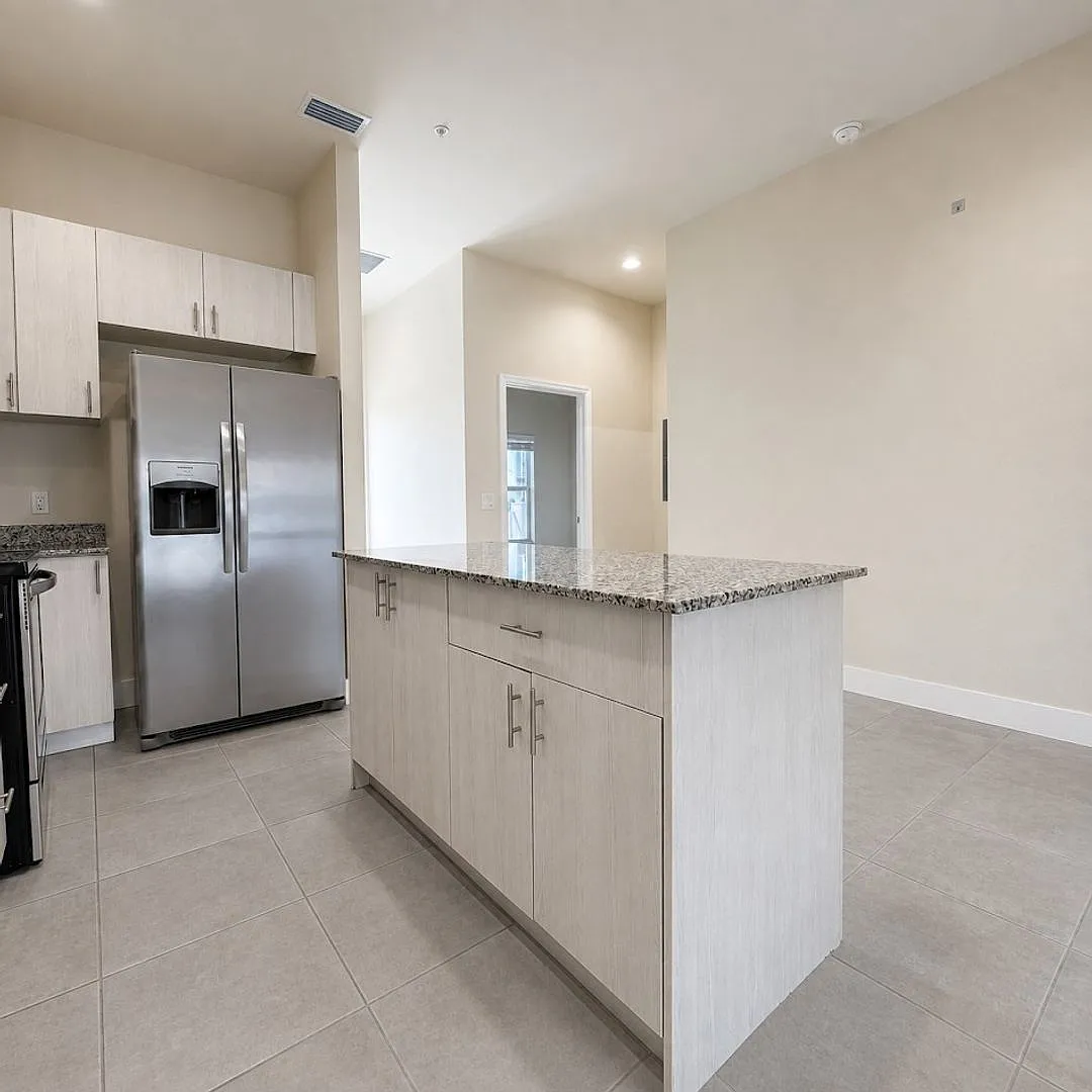 3221-3409 SW 8th Pl — Photo 3