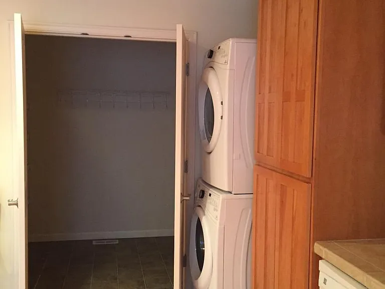 Walk in pantry and full size washer and dryer
