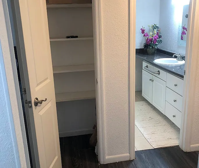 Linen closet and guest bathroom.