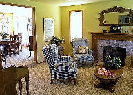 Another view of the living room shows how it flows into the dining room or vice versa for comfortabl