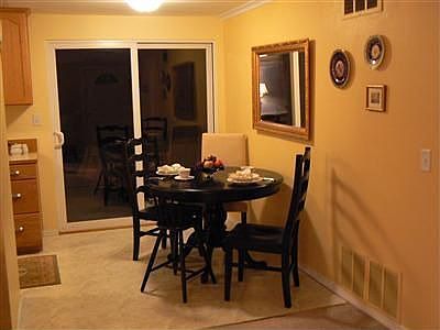 Dining Space off Kitchen fits atable for 6+
