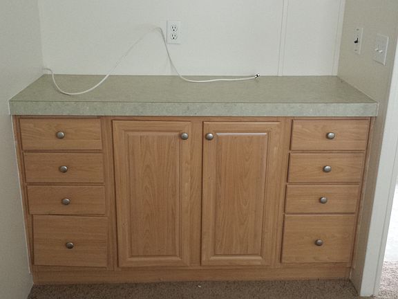Built in counter and storage in bedroom
