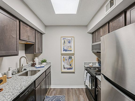 Kitchen with granite counters and modern cabinetry