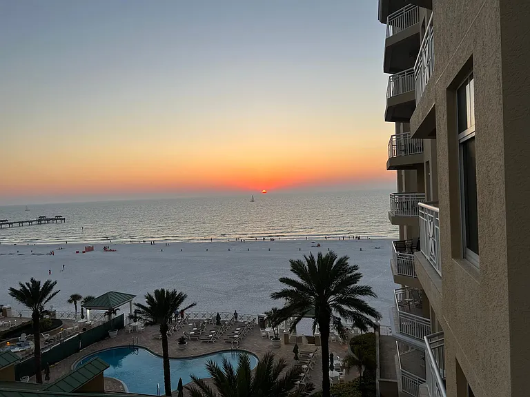 Living room balcony view at sunset.