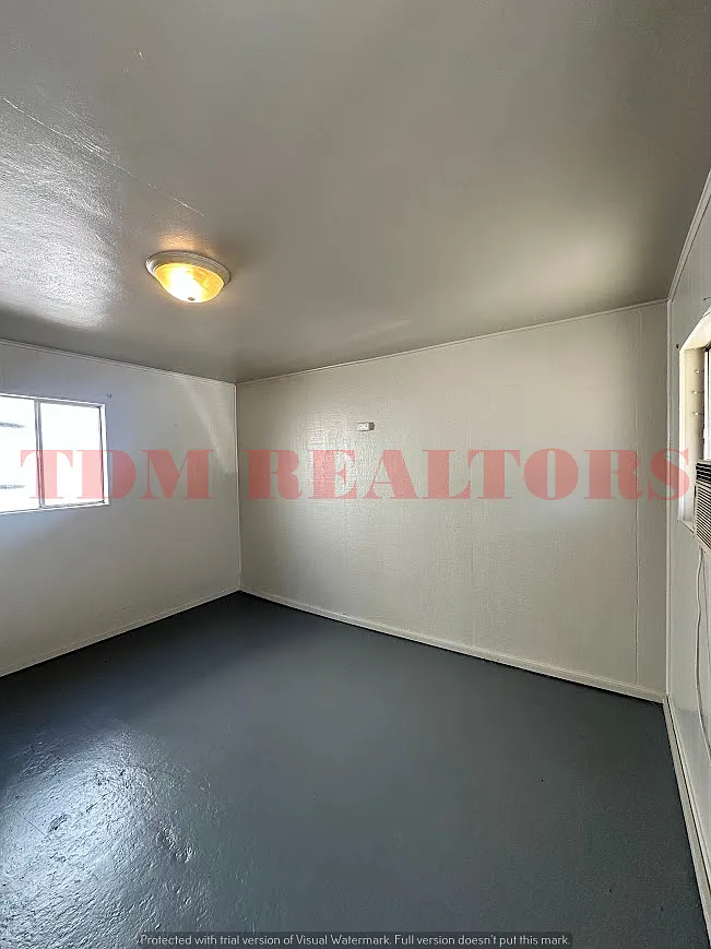 Building Photo - 7134 N Dort Hwy #5