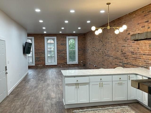 Main entrance, Kitchen, Living Room overlooking Laporte Street