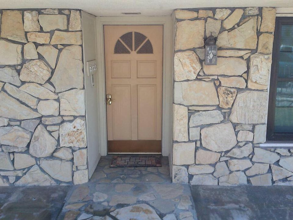 Front entrance to Four Plex leads to entrance hall.