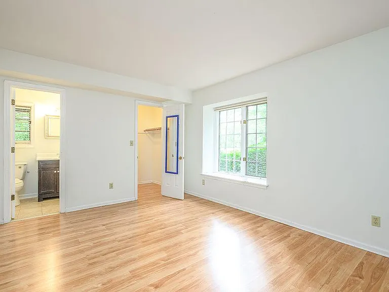 Large first-floor master bedroom with walk-in closet and en-suite full bathroom
