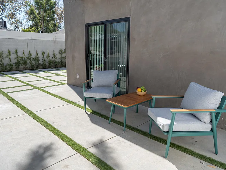 PRIVATE FENCED PATIO WITH OUTDOOR SEATING/FURNITURE
