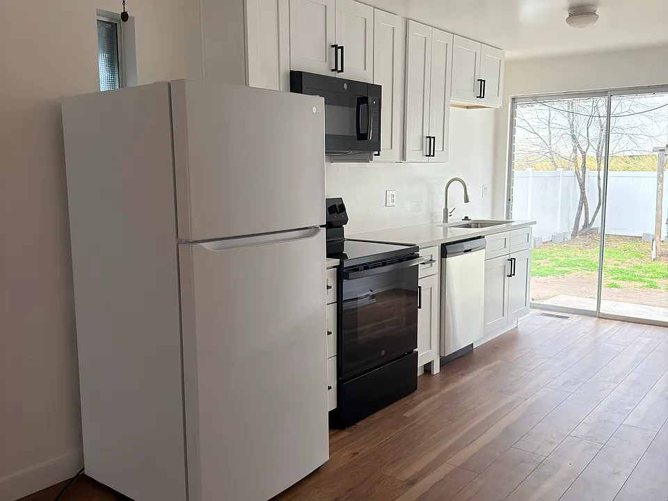 Modern kitchen layout with ample cabinet and counter space