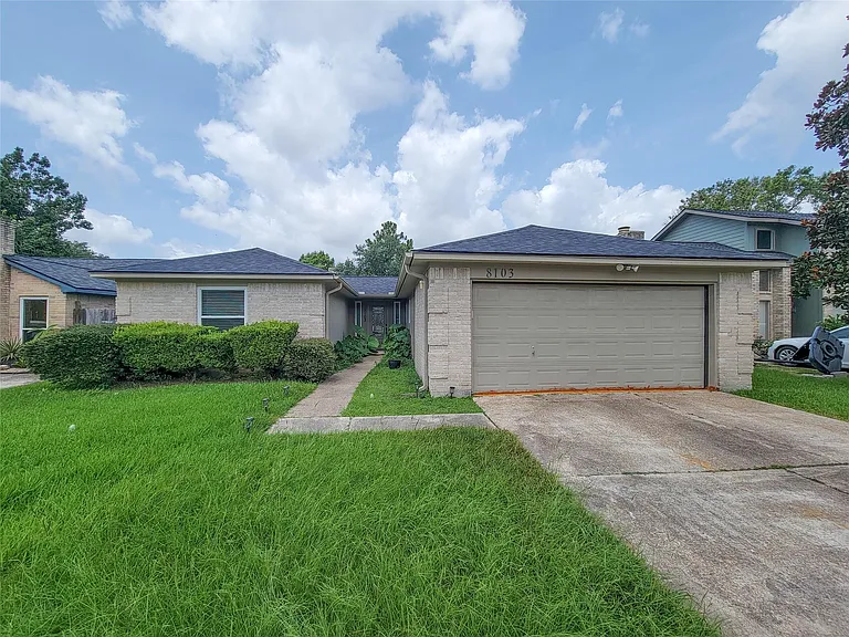 8103 Wind Forest Dr — Photo 35