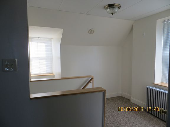 Top of stairs from apt. 4 entry