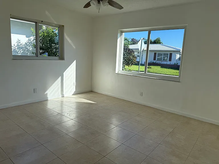Master Bedroom - Hurricane impact windows and Vertical Shutters