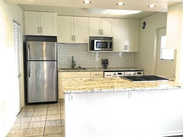 Kitchen with Jenn Air Stove