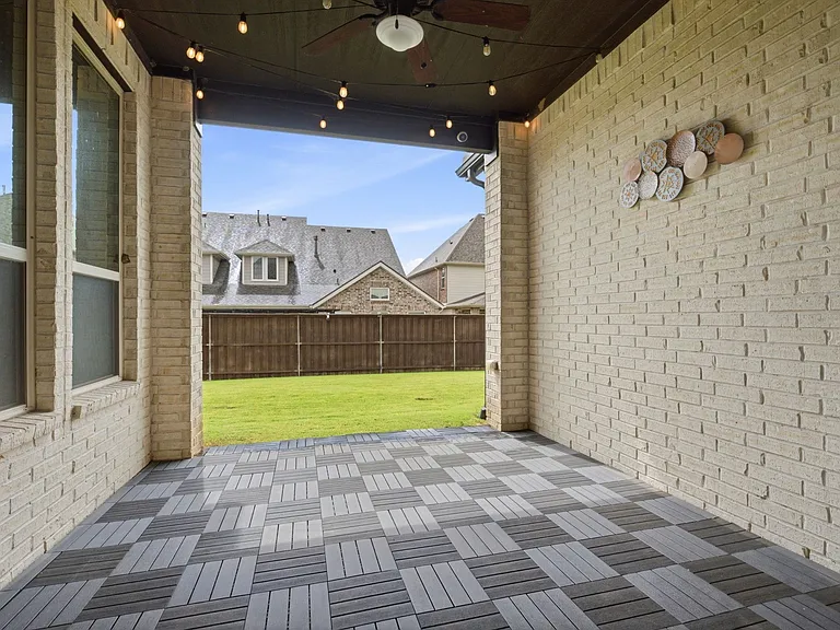 Spacious Covered Patio w/ Ceiling Fan